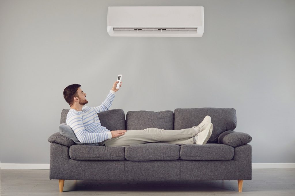 air conditioner, man, sofa